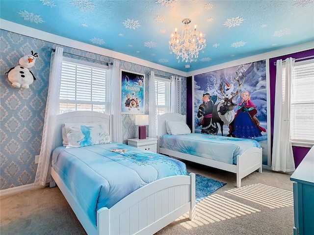 bedroom featuring carpet floors, a textured ceiling, and a chandelier