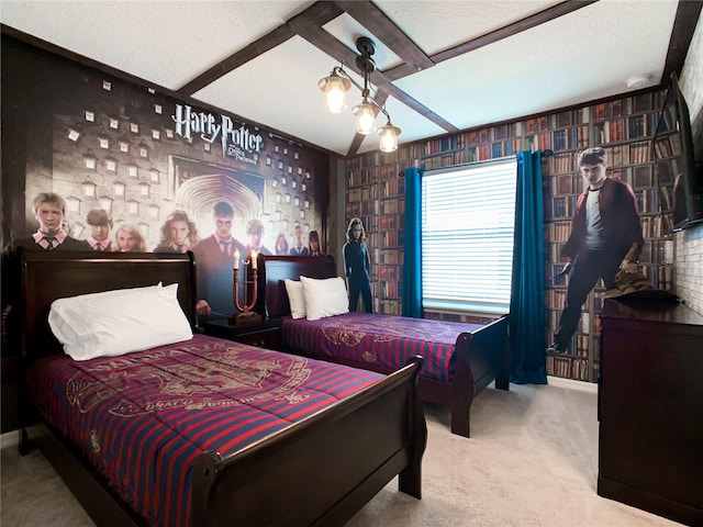 bedroom featuring a textured ceiling and carpet