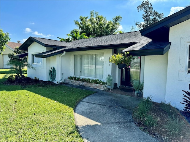 view of front of home with a front yard