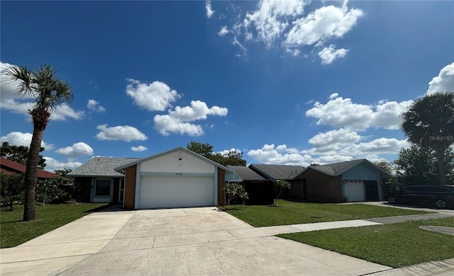 ranch-style home featuring a garage and a front lawn