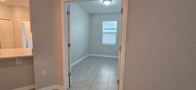 1007 Theodore St, Davenport, FL 33837 - hall featuring baseboards and light tile patterned floors