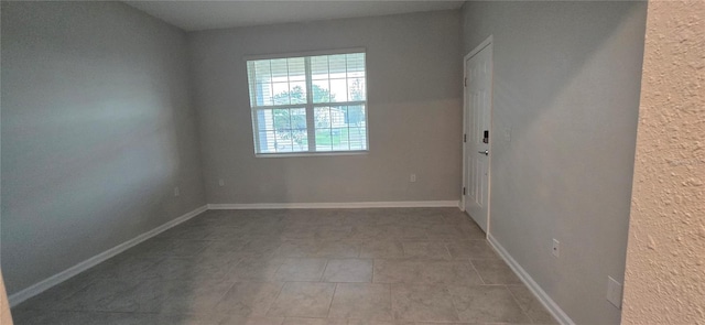 1007 Theodore St, Davenport, FL 33837 - unfurnished room featuring baseboards