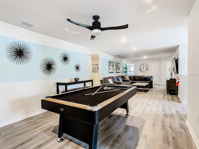 recreation room with light hardwood / wood-style floors, ceiling fan, and billiards