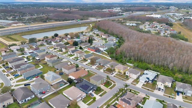 bird's eye view with a water view
