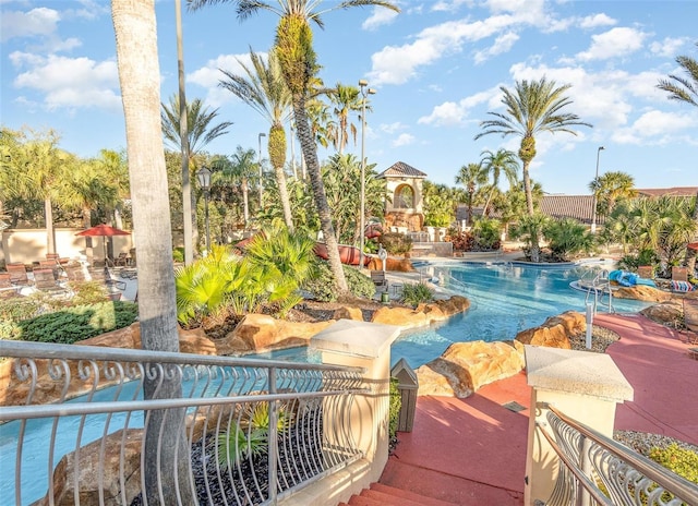 view of swimming pool with a patio and a gazebo