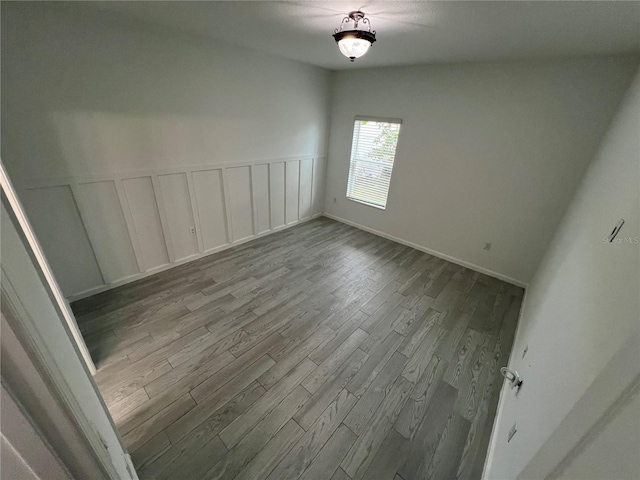 empty room with light hardwood / wood-style flooring