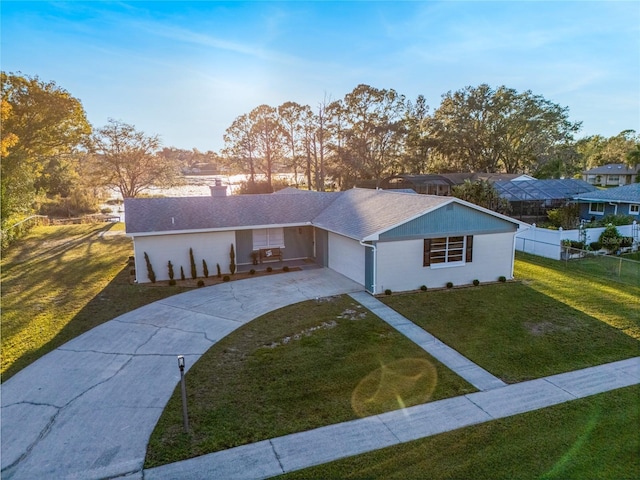 single story home featuring a front yard