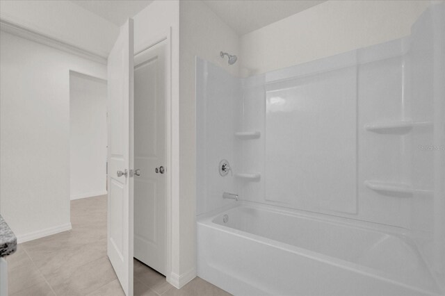 bathroom featuring tile patterned floors and shower / bath combination