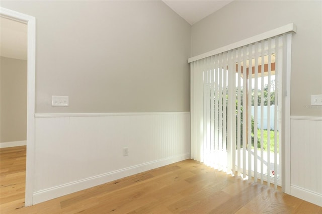 unfurnished room with light hardwood / wood-style floors