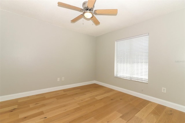 empty room featuring light hardwood / wood-style floors and ceiling fan