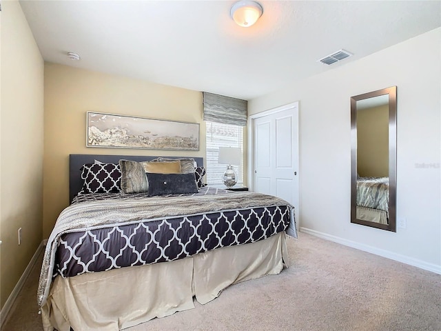 carpeted bedroom featuring a closet