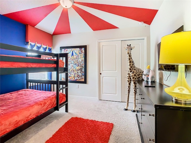 carpeted bedroom with a closet