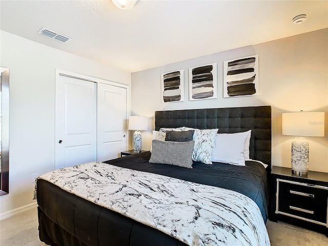 carpeted bedroom featuring a closet