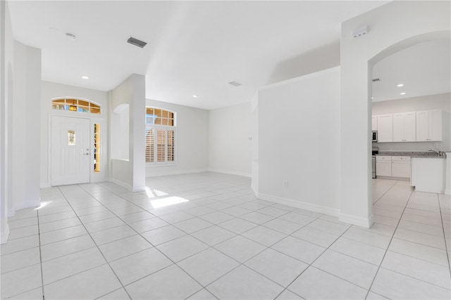 view of tiled foyer entrance