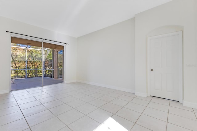 empty room with light tile patterned flooring