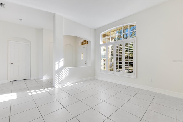 view of tiled spare room