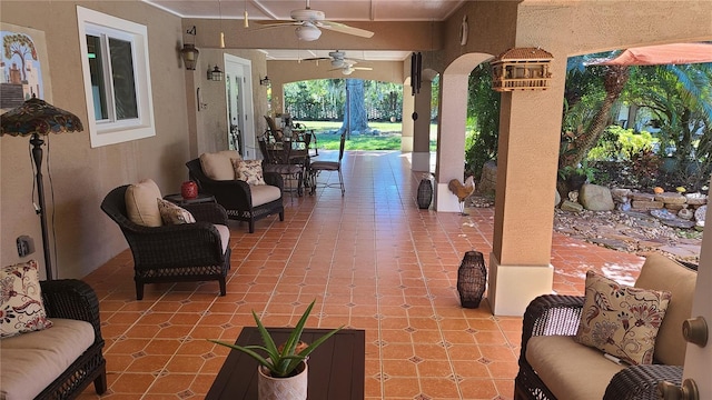 view of patio / terrace featuring ceiling fan and an outdoor hangout area