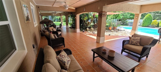 view of patio with ceiling fan and an outdoor hangout area