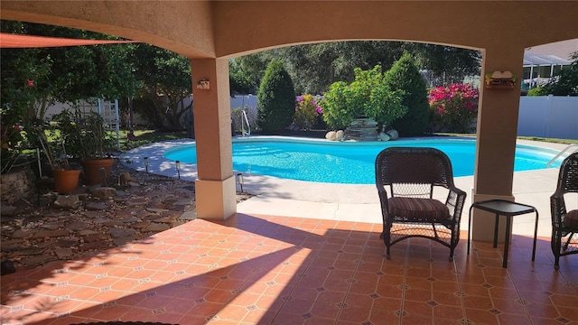 view of swimming pool with a fenced in pool, a patio area, and a fenced backyard