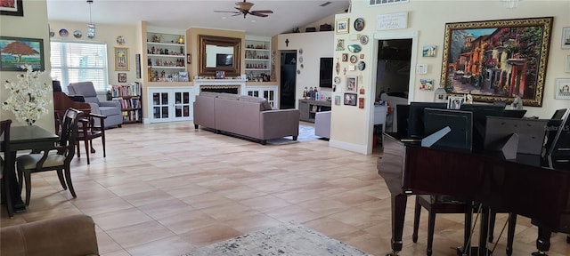 interior space with lofted ceiling and a ceiling fan