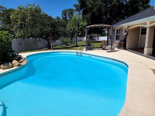 view of pool featuring a fenced in pool, a pergola, a fenced backyard, a yard, and a patio area