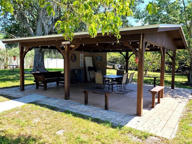 view of patio / terrace with fence and a gazebo