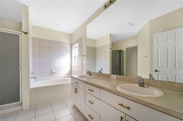 bathroom featuring separate shower and tub, tile patterned flooring, and vanity