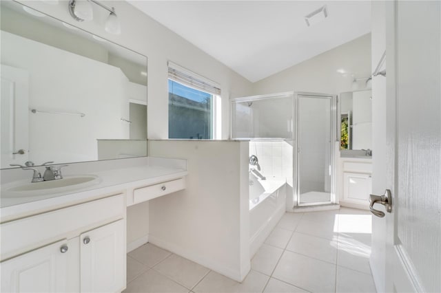 bathroom featuring tile patterned flooring, vanity, lofted ceiling, and independent shower and bath