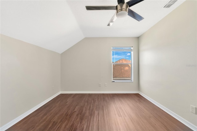 bonus room featuring hardwood / wood-style floors, vaulted ceiling, and ceiling fan