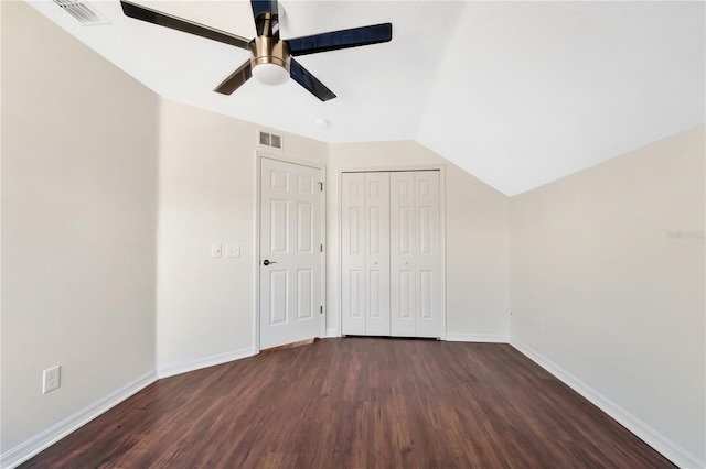 additional living space featuring ceiling fan, dark hardwood / wood-style flooring, and vaulted ceiling