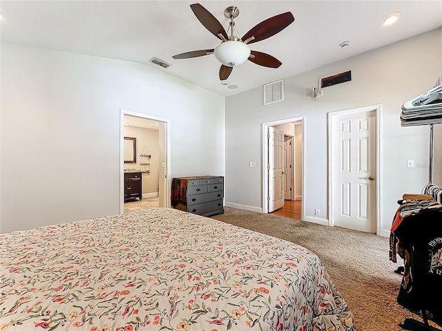 carpeted bedroom with ceiling fan and connected bathroom