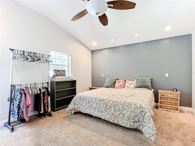 bedroom featuring vaulted ceiling, carpet flooring, and ceiling fan