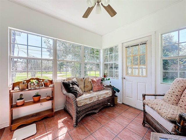 sunroom with plenty of natural light and ceiling fan