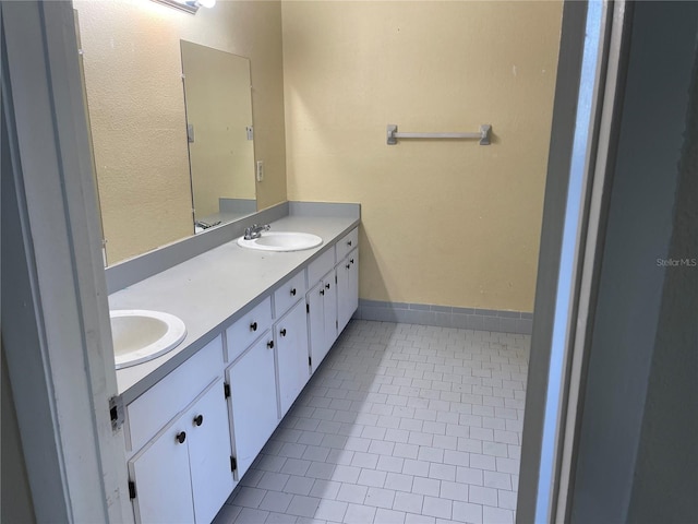 bathroom featuring vanity and tile patterned flooring