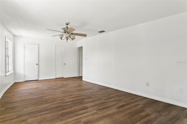 interior space featuring ceiling fan and dark hardwood / wood-style floors