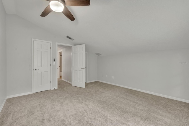 bonus room featuring vaulted ceiling, ceiling fan, and light colored carpet