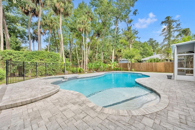 view of pool featuring a patio