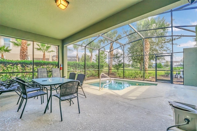 view of pool featuring a lanai and a patio area