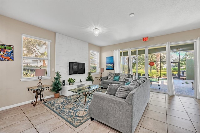 tiled living room with a textured ceiling