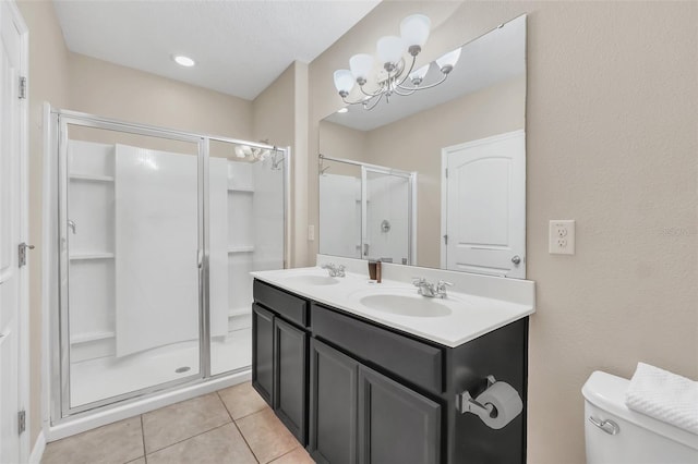 bathroom with vanity, an enclosed shower, tile patterned floors, an inviting chandelier, and toilet