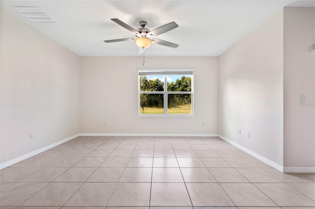 unfurnished room featuring ceiling fan and light tile patterned floors