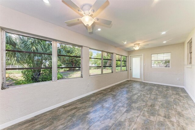 empty room featuring ceiling fan