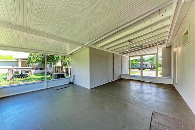 interior space with ceiling fan