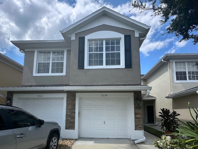 view of front of home with a garage