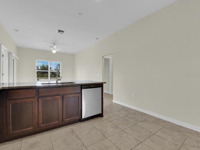 kitchen with dishwasher, ceiling fan, light tile patterned floors, and sink