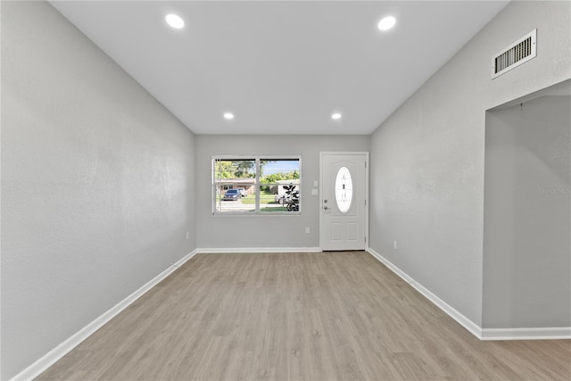 foyer with light wood-type flooring