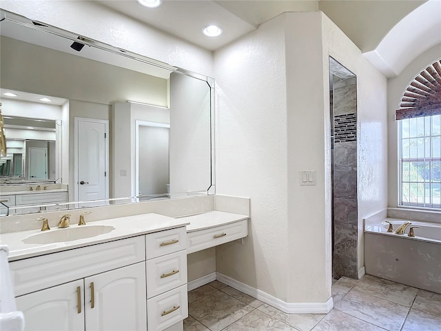 bathroom featuring vanity and a bathtub