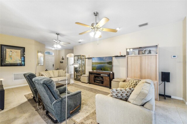 living room featuring ceiling fan