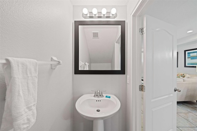 bathroom with sink and tile patterned floors