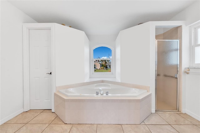 bathroom featuring separate shower and tub and tile patterned flooring